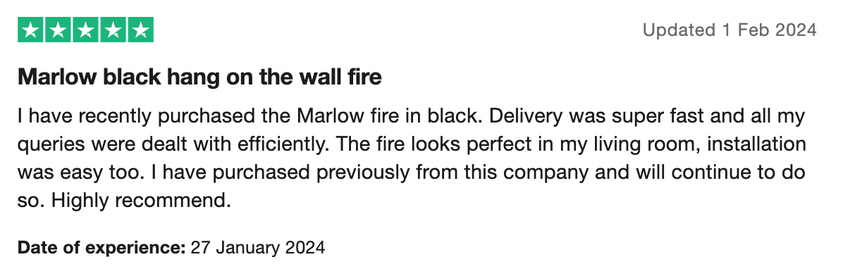 Positive customer review for a black wall-mounted bioethanol fireplace