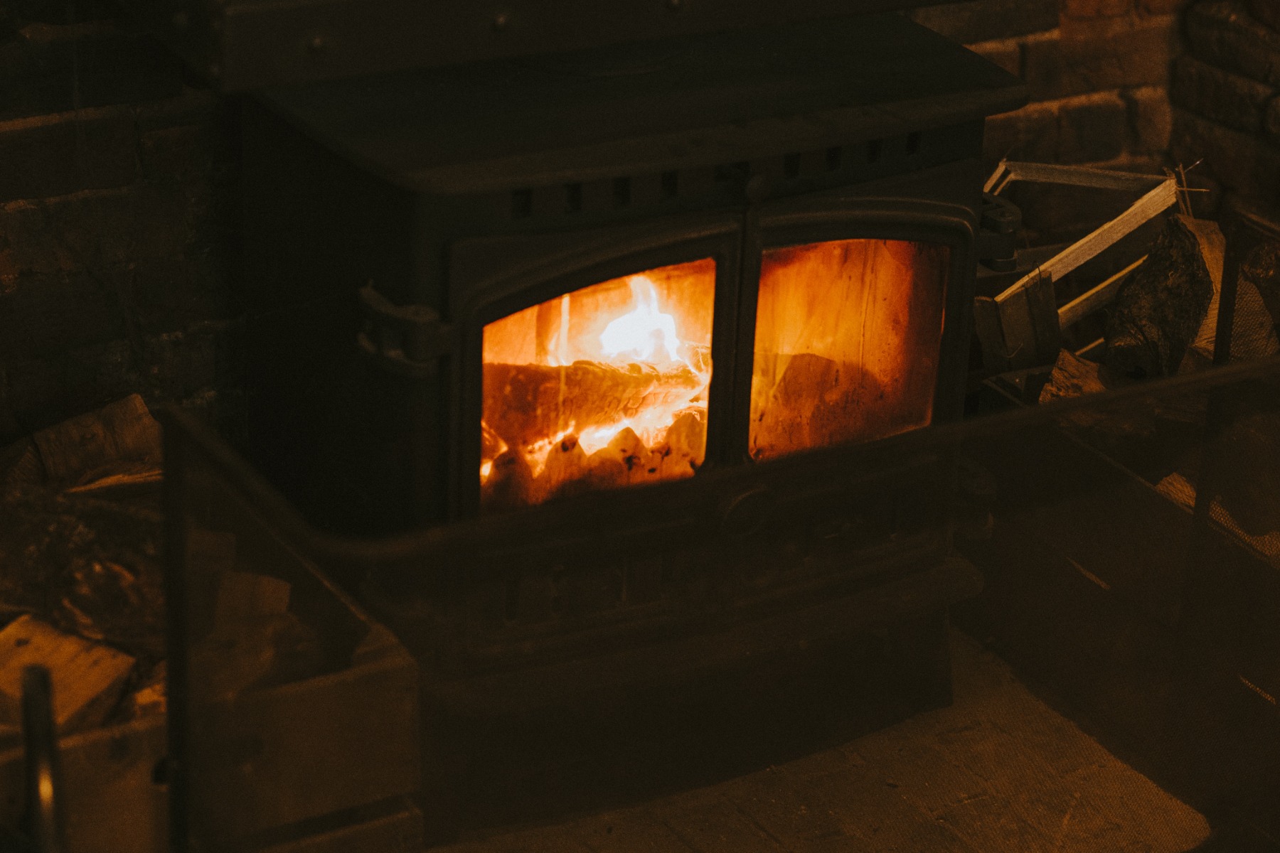Black wood burning stove in use