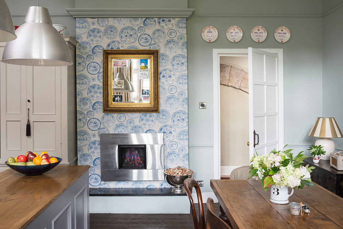 Wallpaper around chimney breast in kitchen