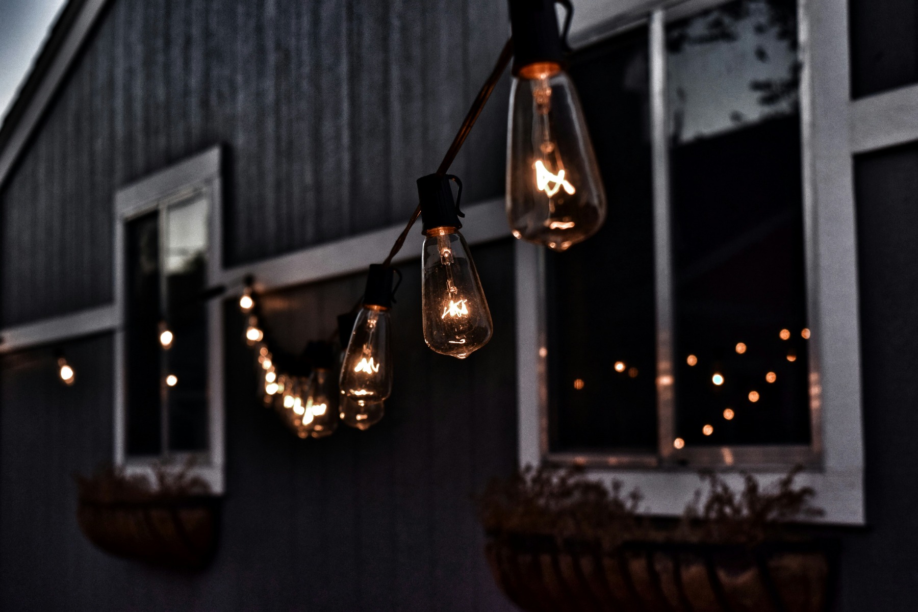 Light bulbs hanging on a string in night