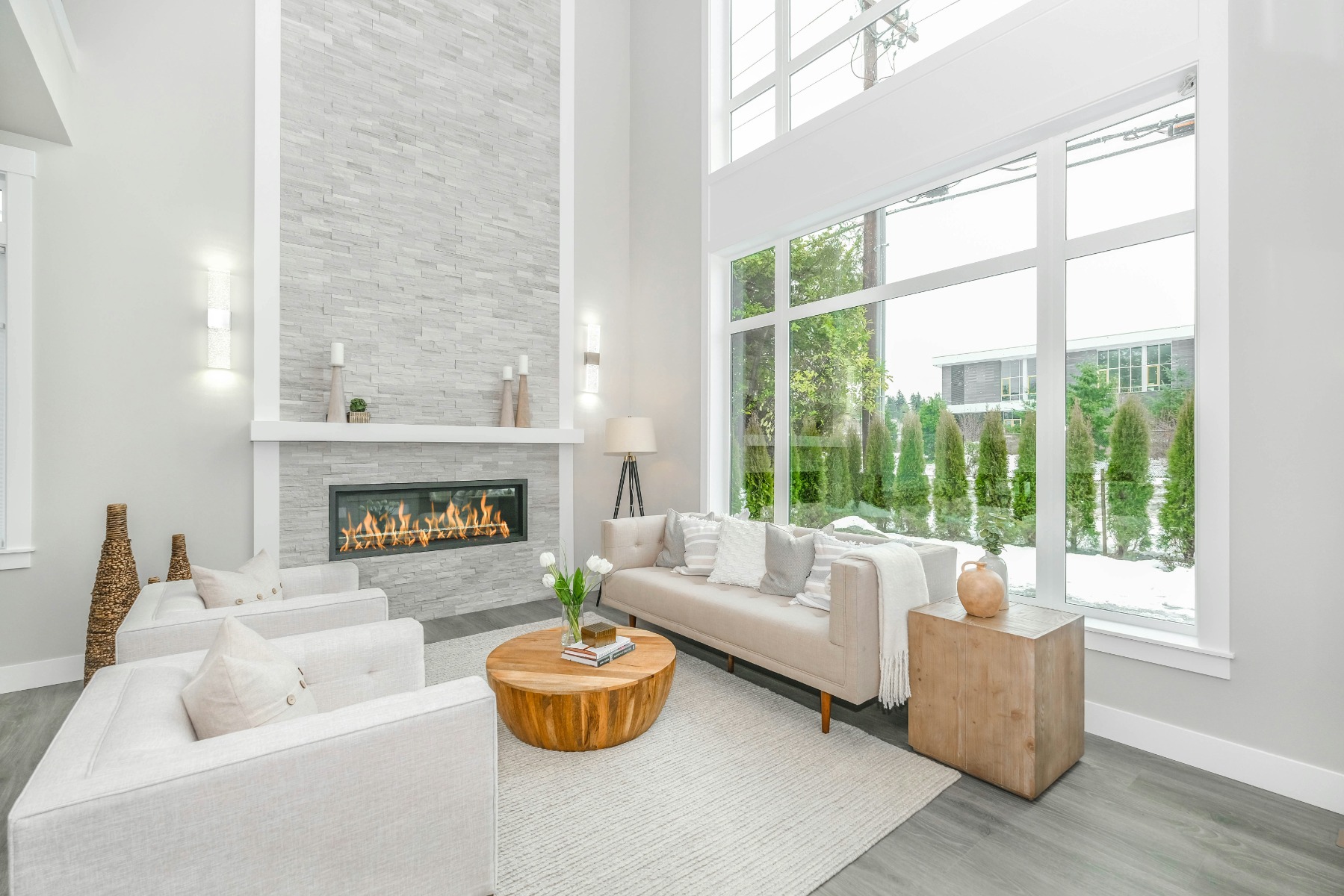 White living room with a modern ventless fireplace